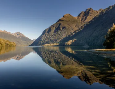 Large lake with mountains in the background