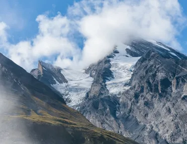 Mountains with clouds over them