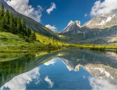 Large lake surrounded by tall hills and mountains