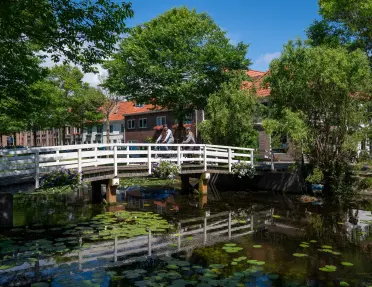 Kippenbrug (Chicken Bridge) crossing the Oudegracht canal in the historic town of Weesp, near Amsterdam, in the Netherlands.