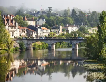 A medieval village on the river on the Bordeaux & Dordogne Bike Tour