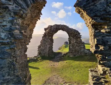 Large stone arches in the middle of a valley