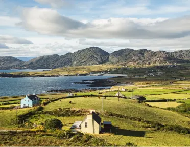 Open valley with a lake in the distance
