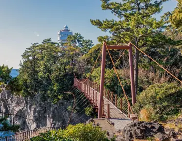 Kadowaki lighthouse and the suspension bridge on the Izu Peninsula.