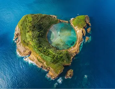 Sky view of a small island in the middle of the ocean