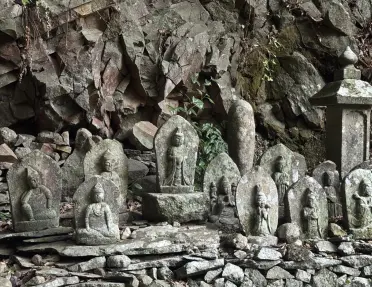 Stone Buddhist carved statues located at Shuzenji Temple's Okunoin in Izu, Japan.