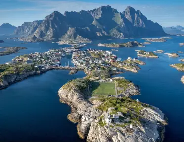 Aerial view of the picturesque fishing village of Henningsvær in the Lofoten Islands of Norway.