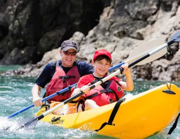 A father and son Kayaking in Costa Rica on a Backroads multisport trip