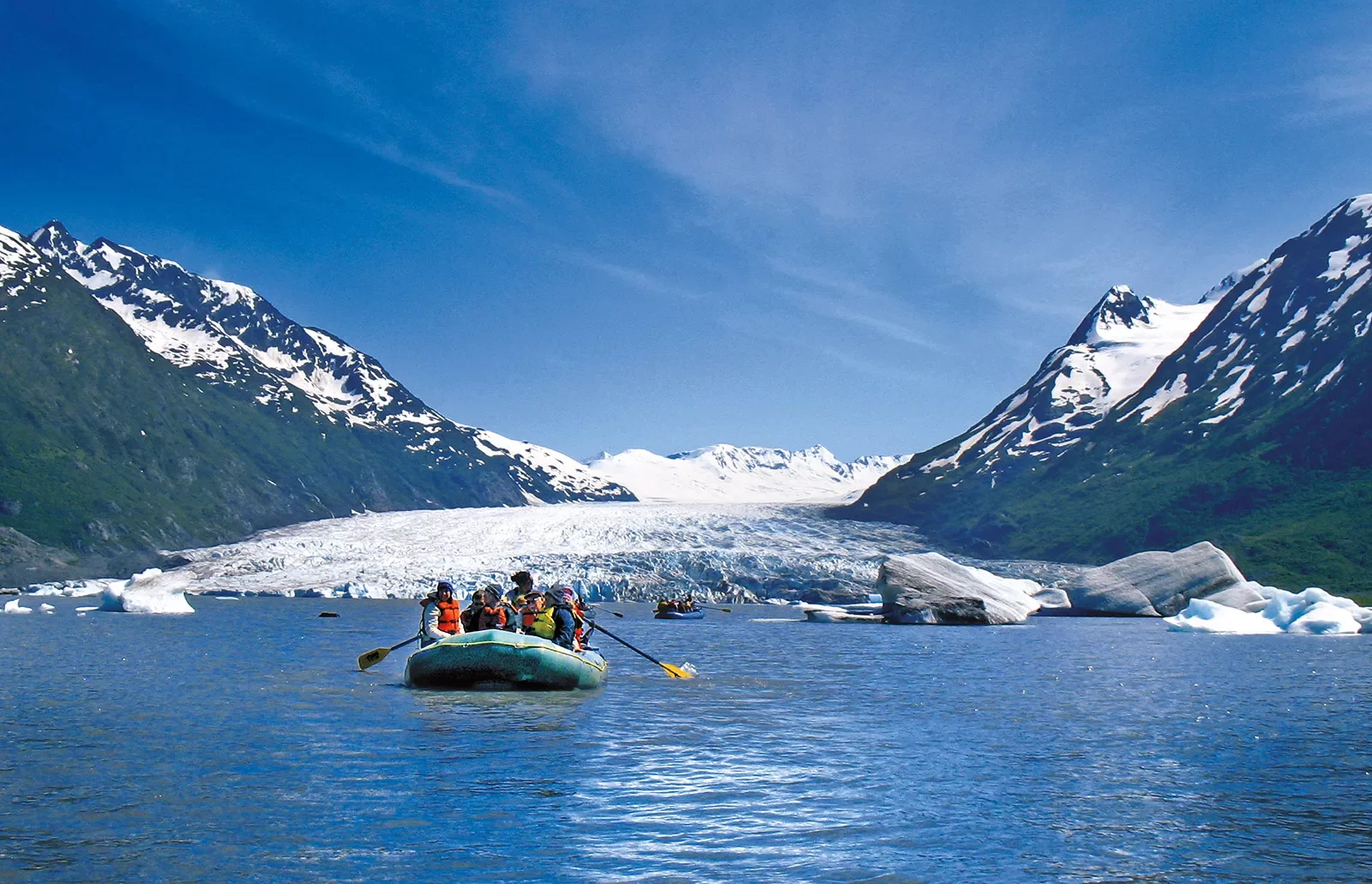 Rafting by a glacier in Alaska