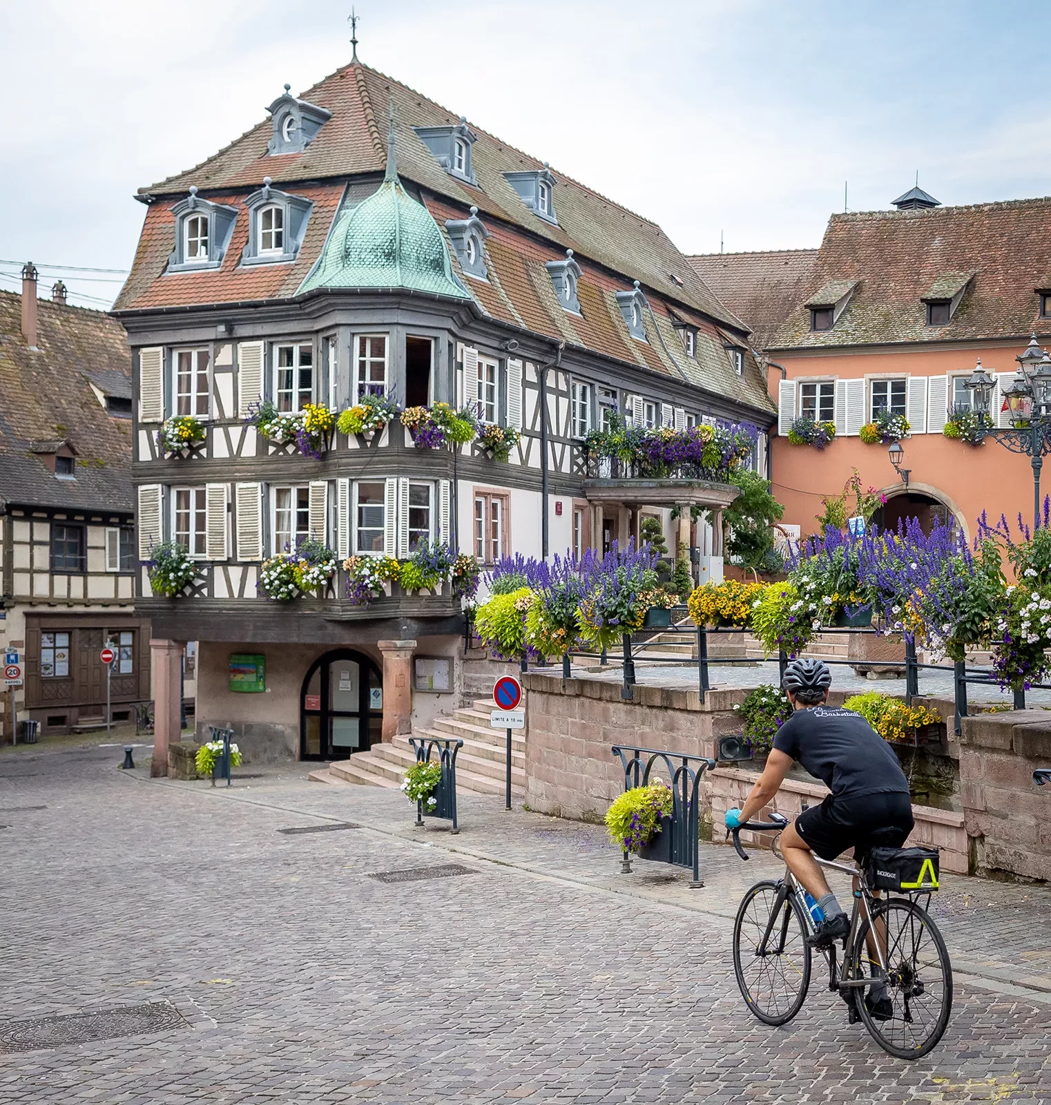 Backroads Guest Biking Through a Town in Alsace