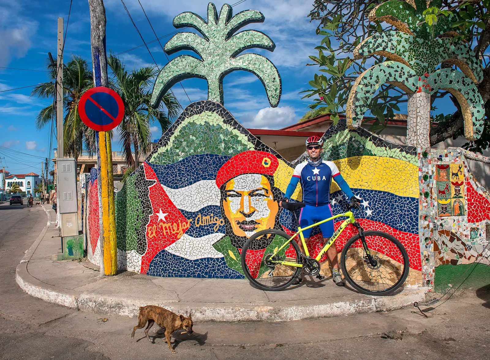 Cyclist in Front of Art Work Cuba