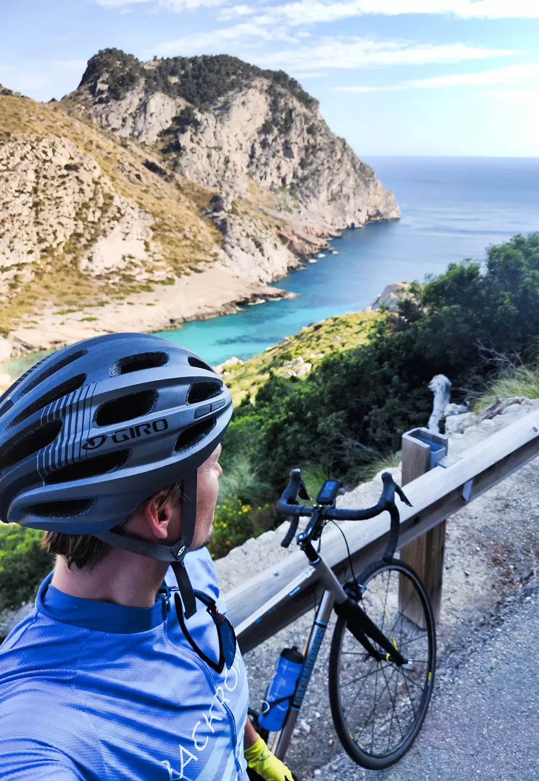 Biker taking selfie along the coast in Mallorca.