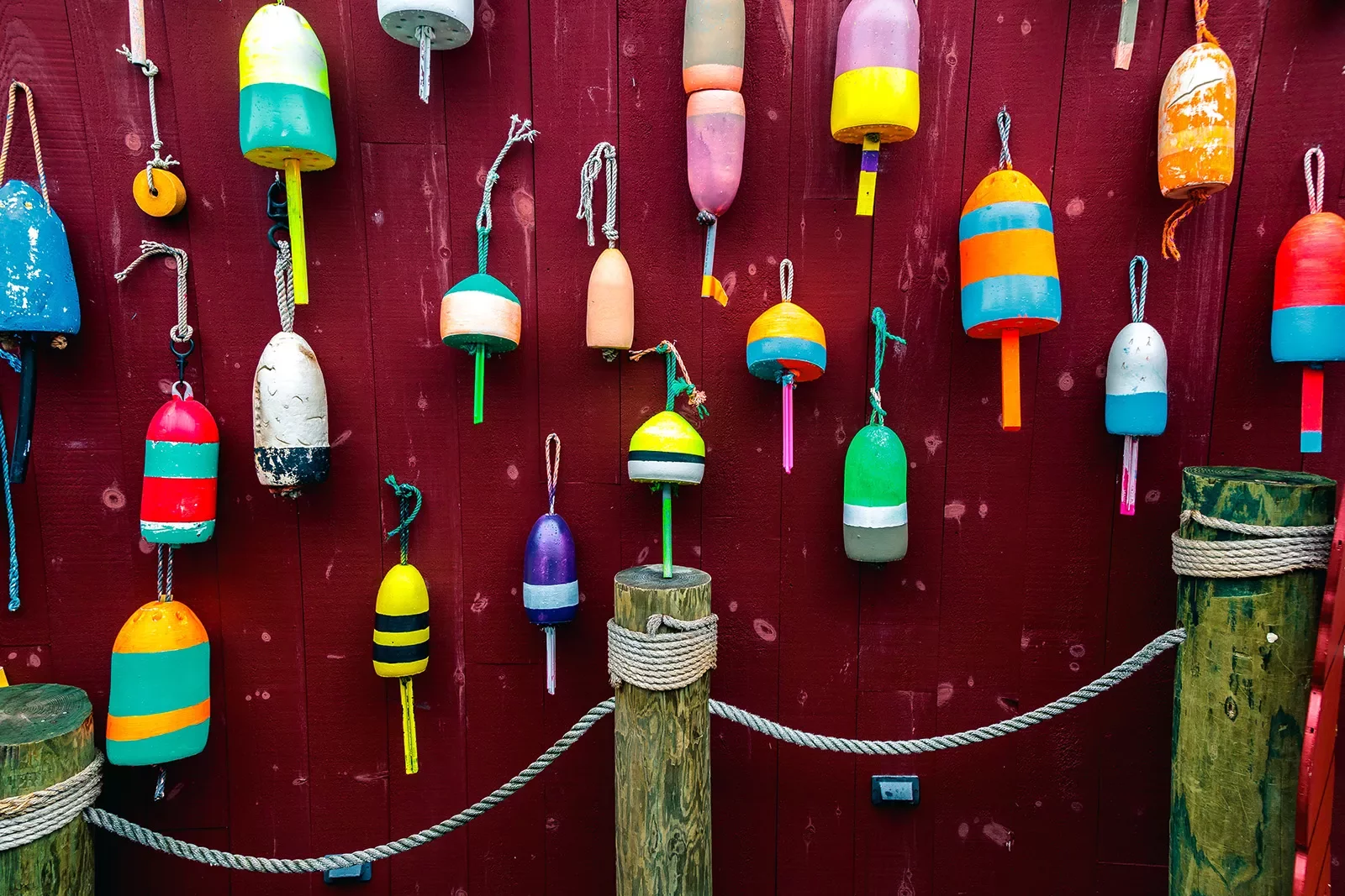 Wall of different colored buoys.