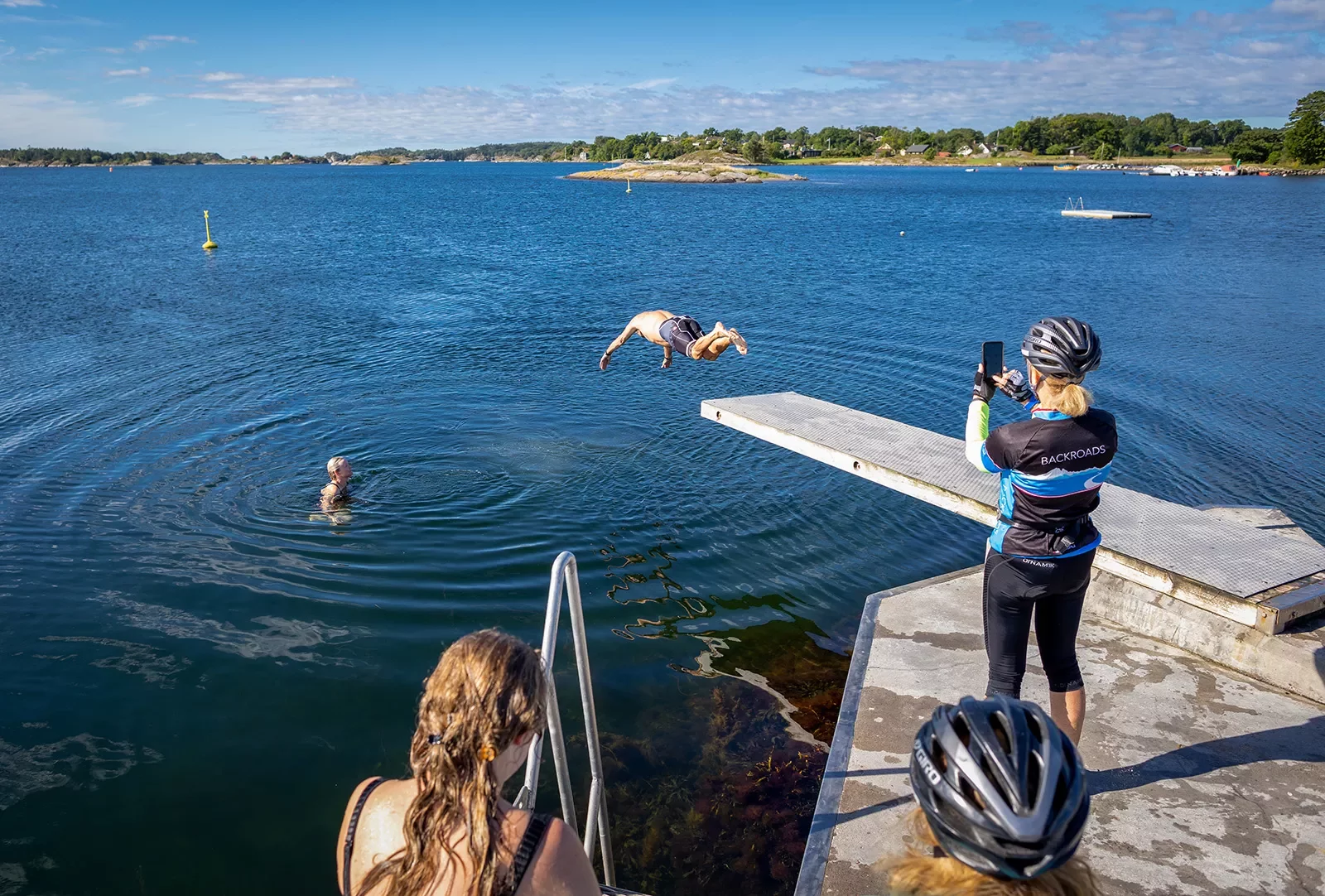 Guests diving into a river in Norway