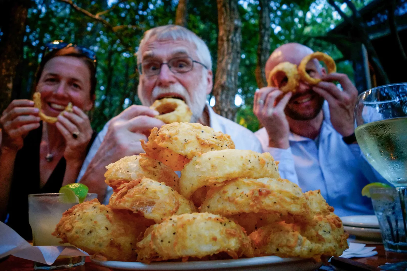 Backroads guests enjoying onions rings and company