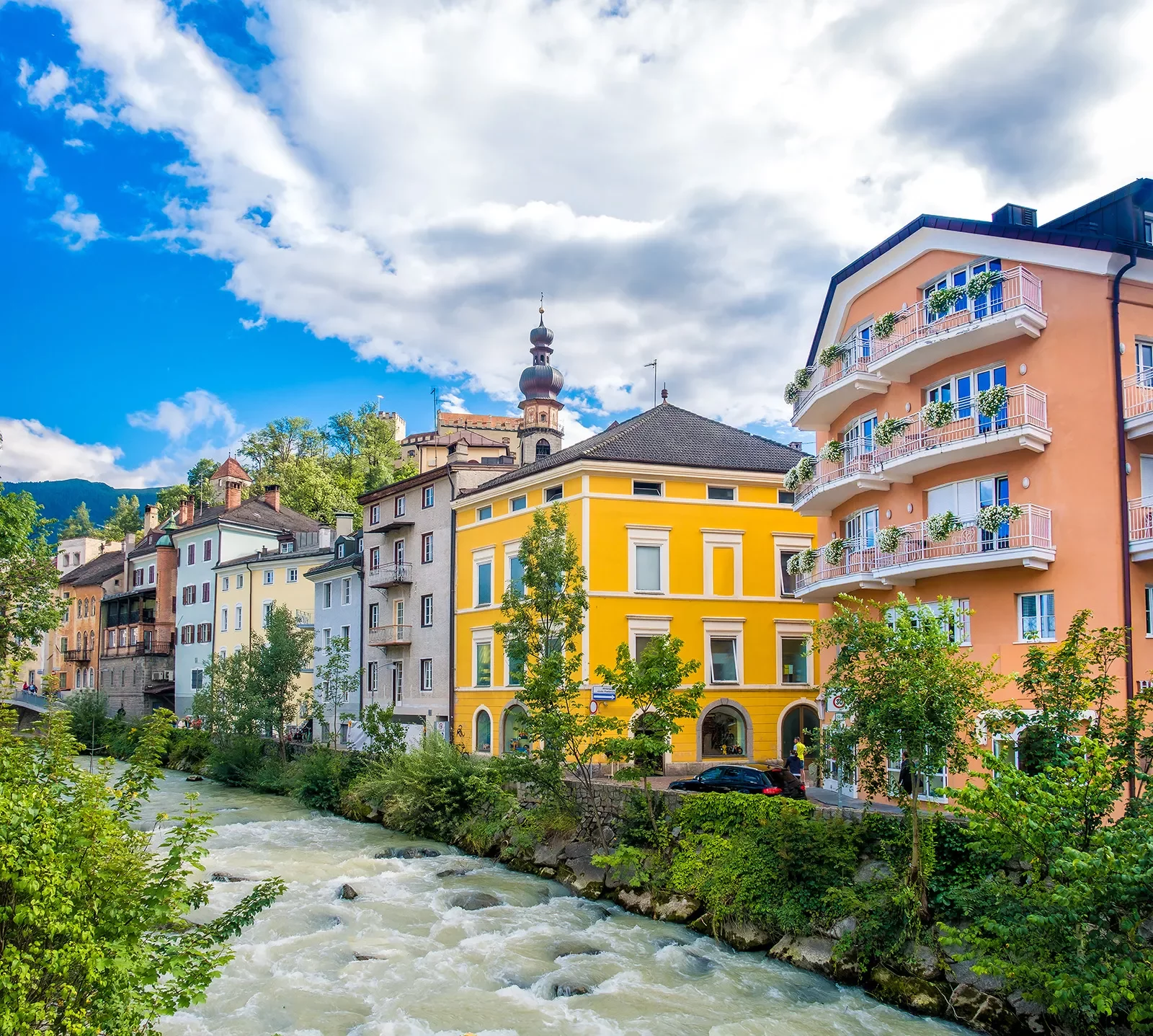 Houses along the Brunico Bruneck River.