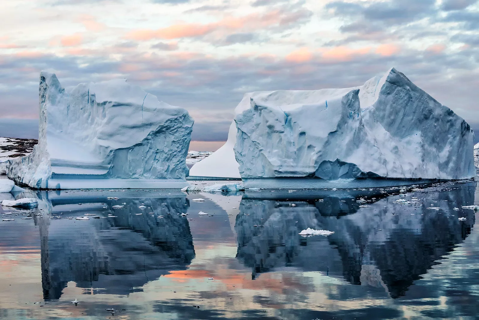 Icebergs floating in icy waters of Antarctica
