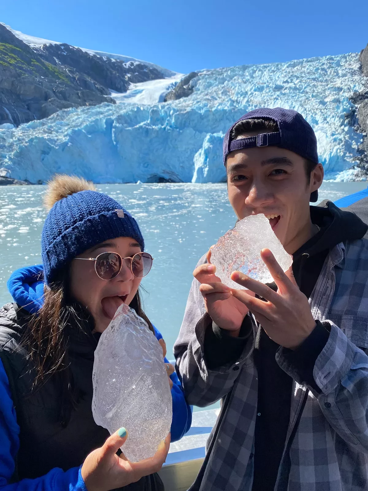 Two guests eating ice in Alaska