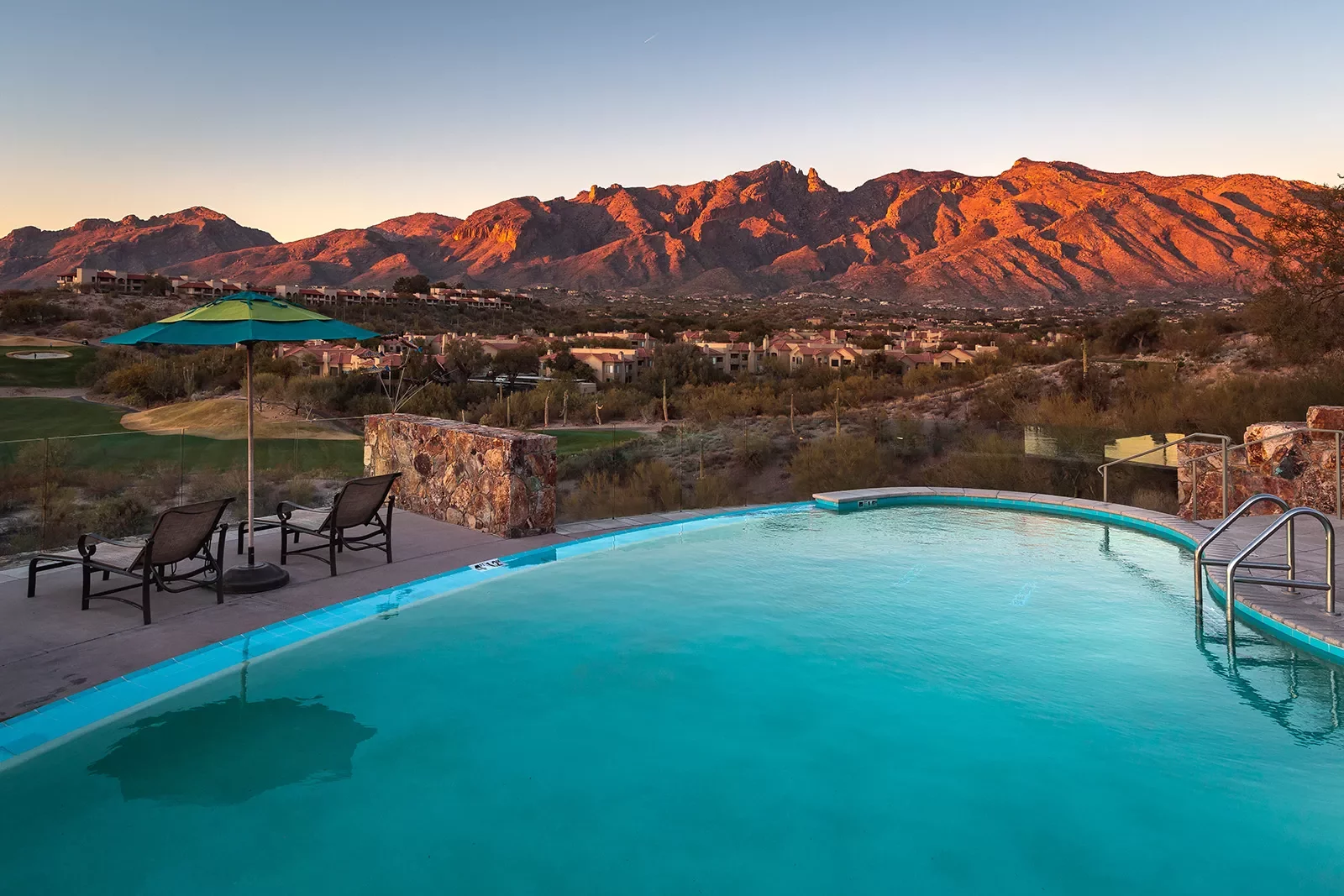Pool shot AZ at sunset with mountain landscape