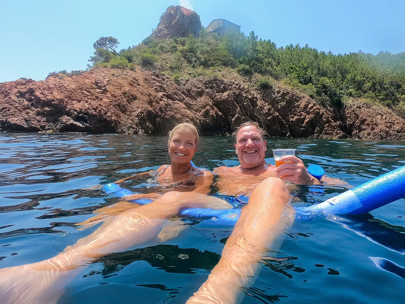 Two Backroads guests swimming in the sea in France