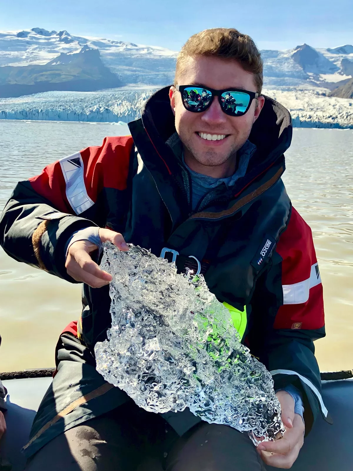 Guest Holding Chunk of Ice Iceland