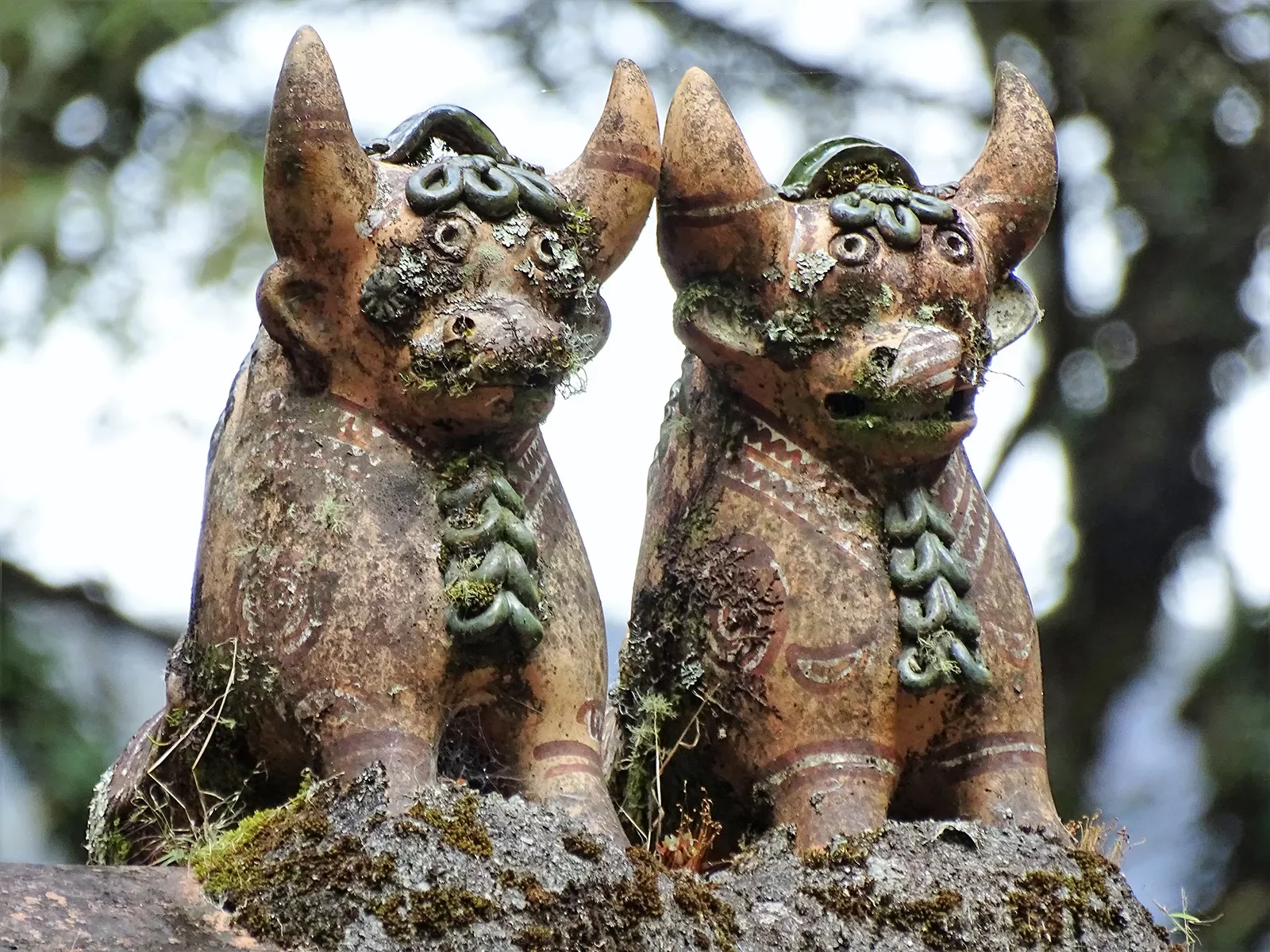 Two old bull statues.