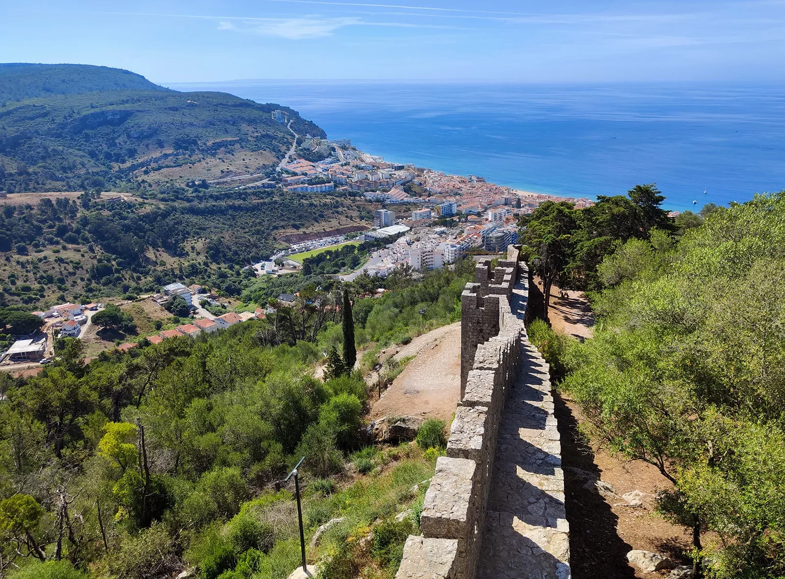 Shot form the wall at Castelo de Sesimbra, overlooking coastal valley town.