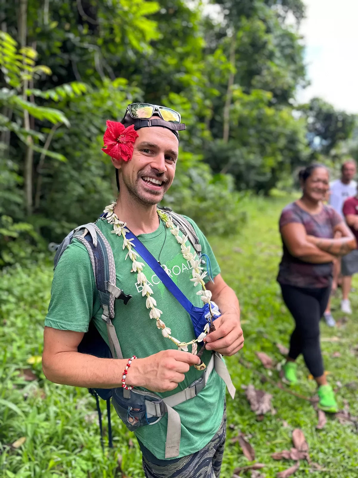 Backroads leader in Tahiti with a flower behind his ear