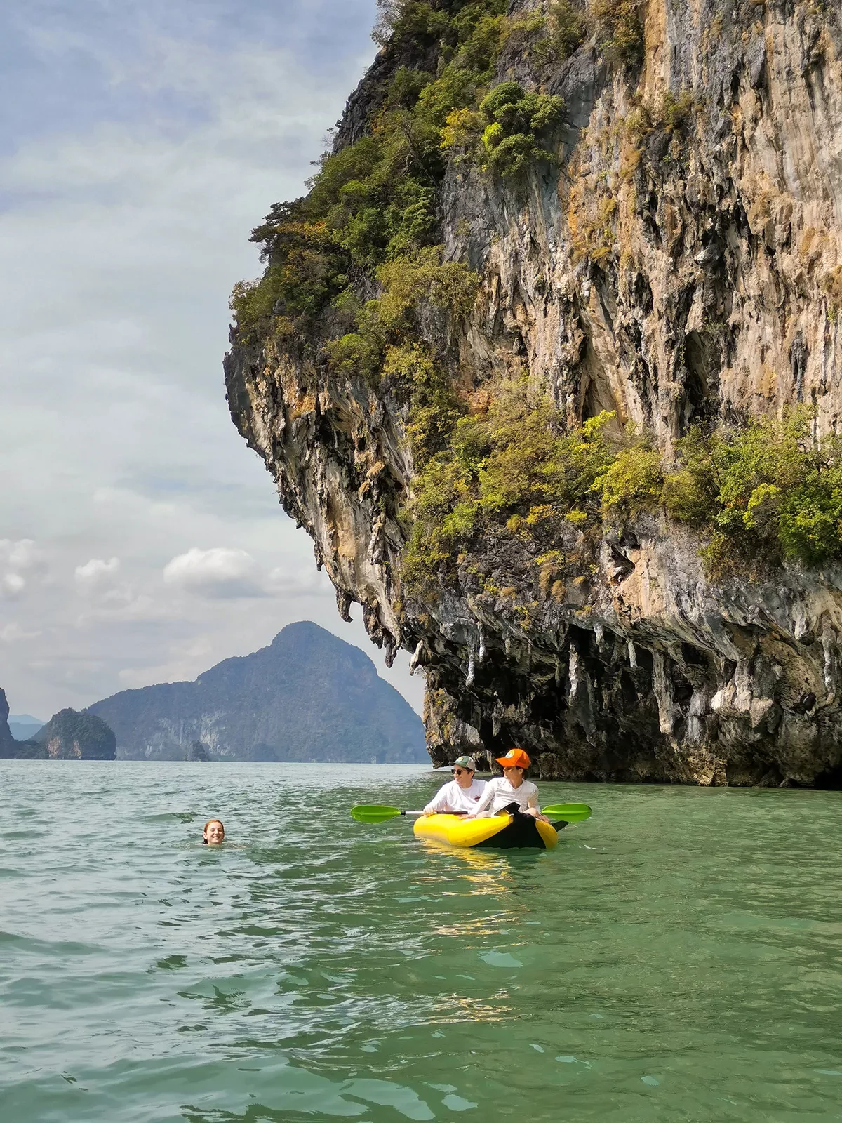 Kayaking in Thailand among large rock formations