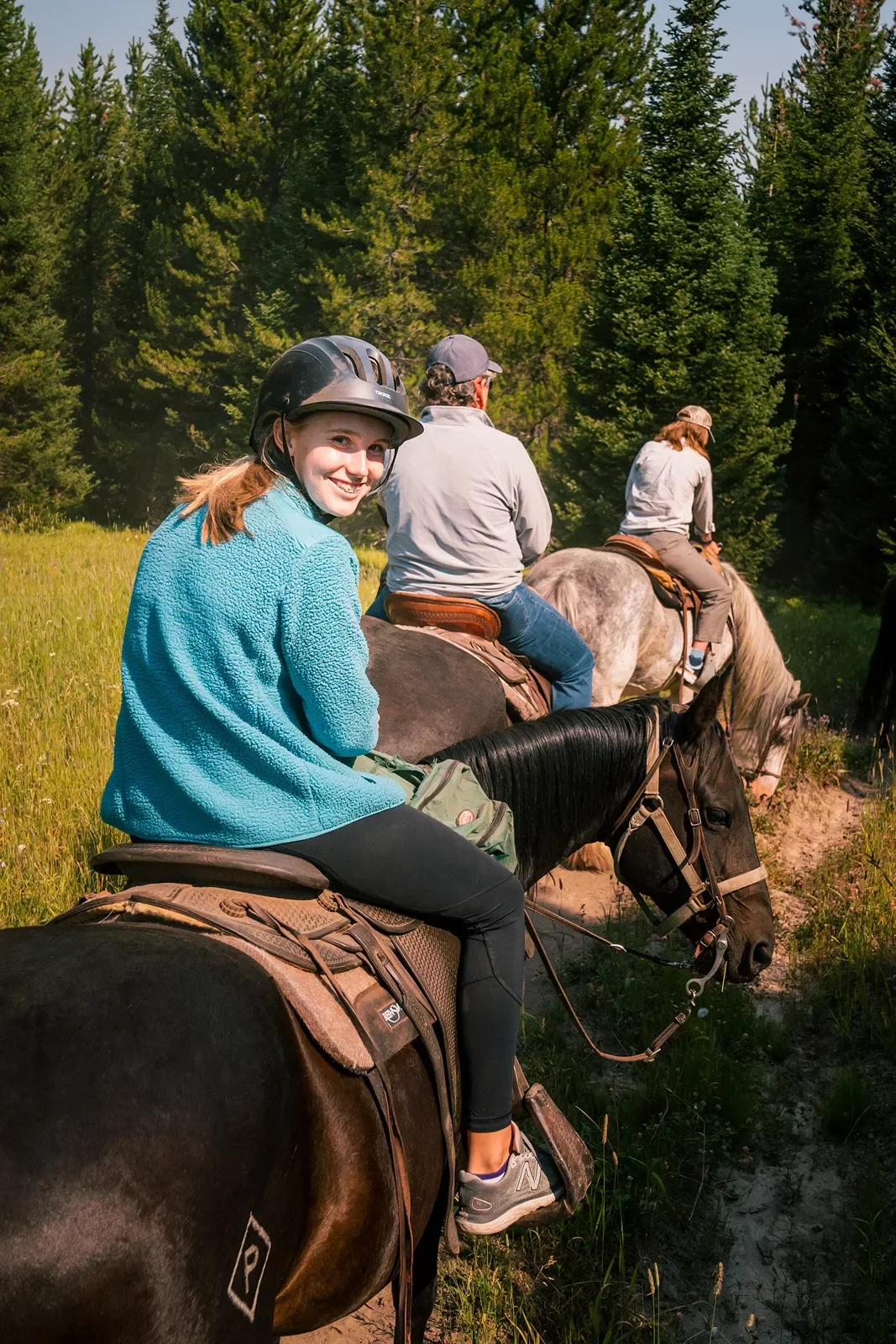 Backroads guests posing while horse back riding