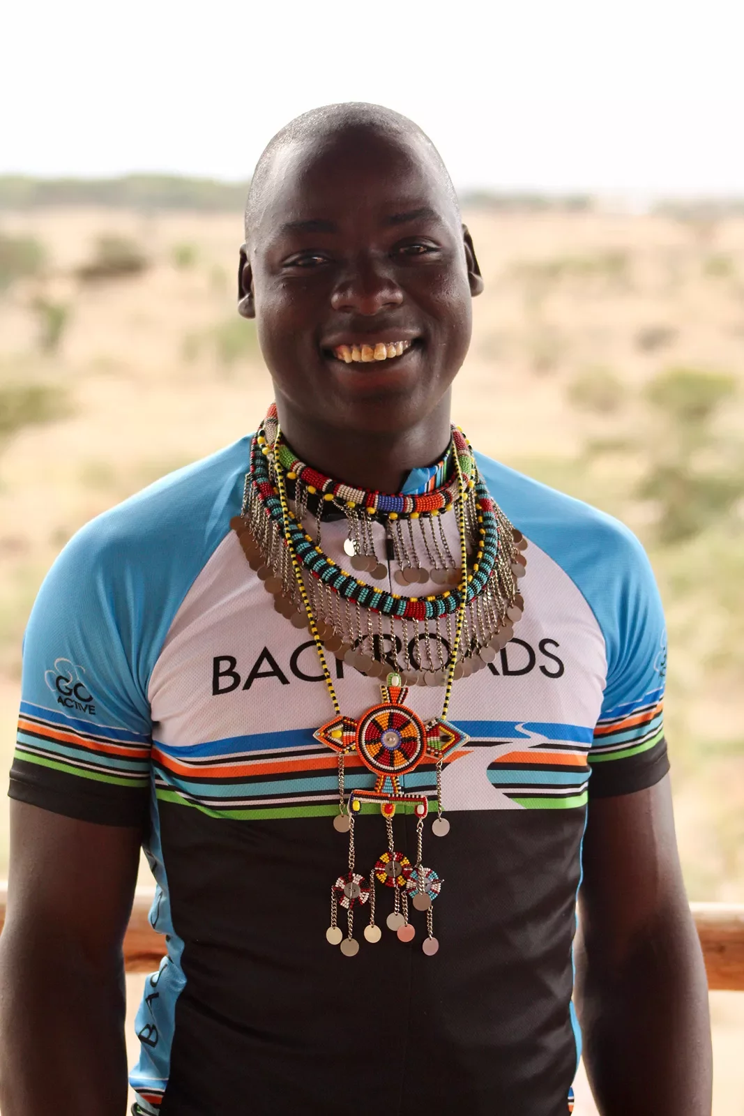 Backroads cyclist wearing traditional local jewelry