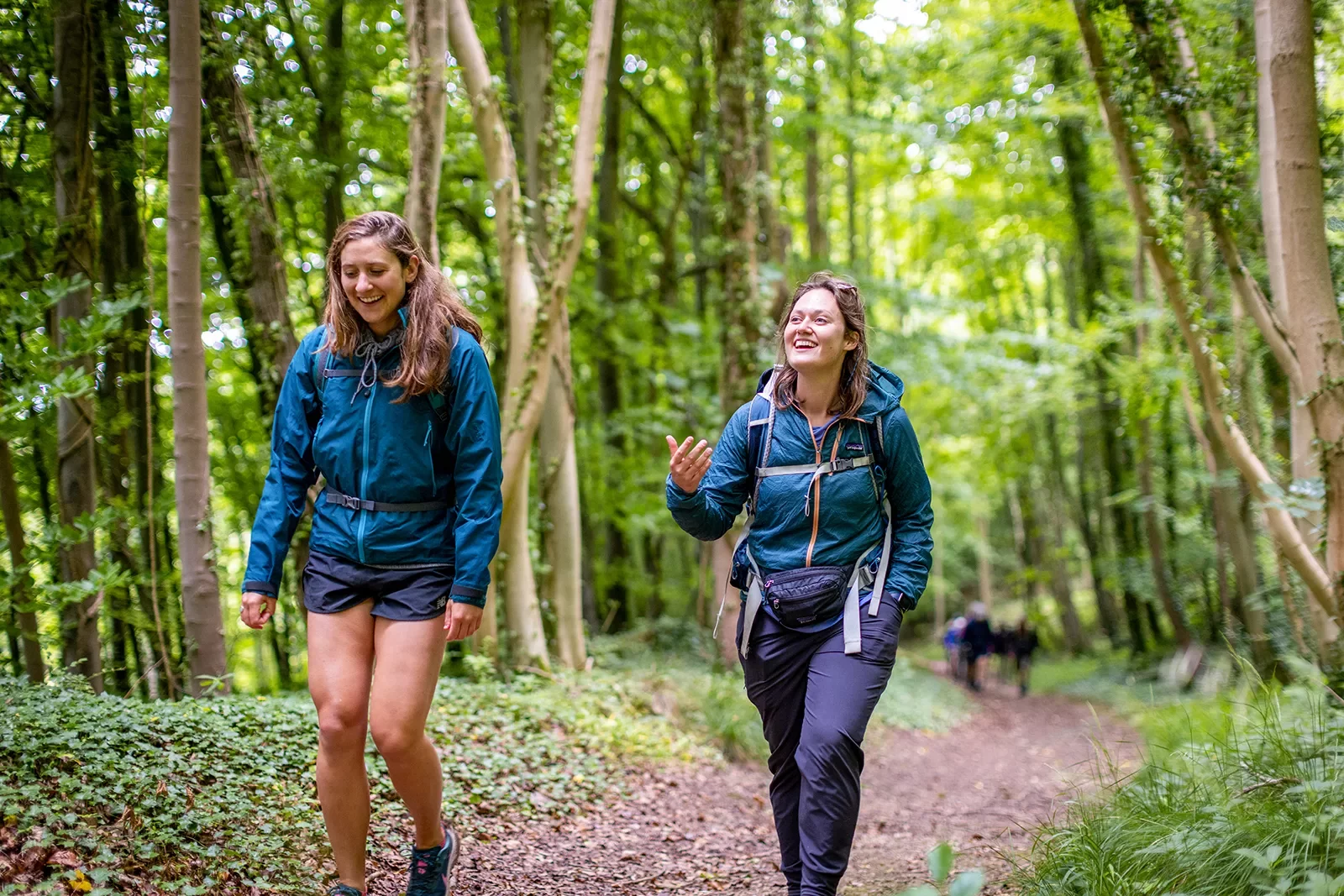 Two women hiking on trail in England.