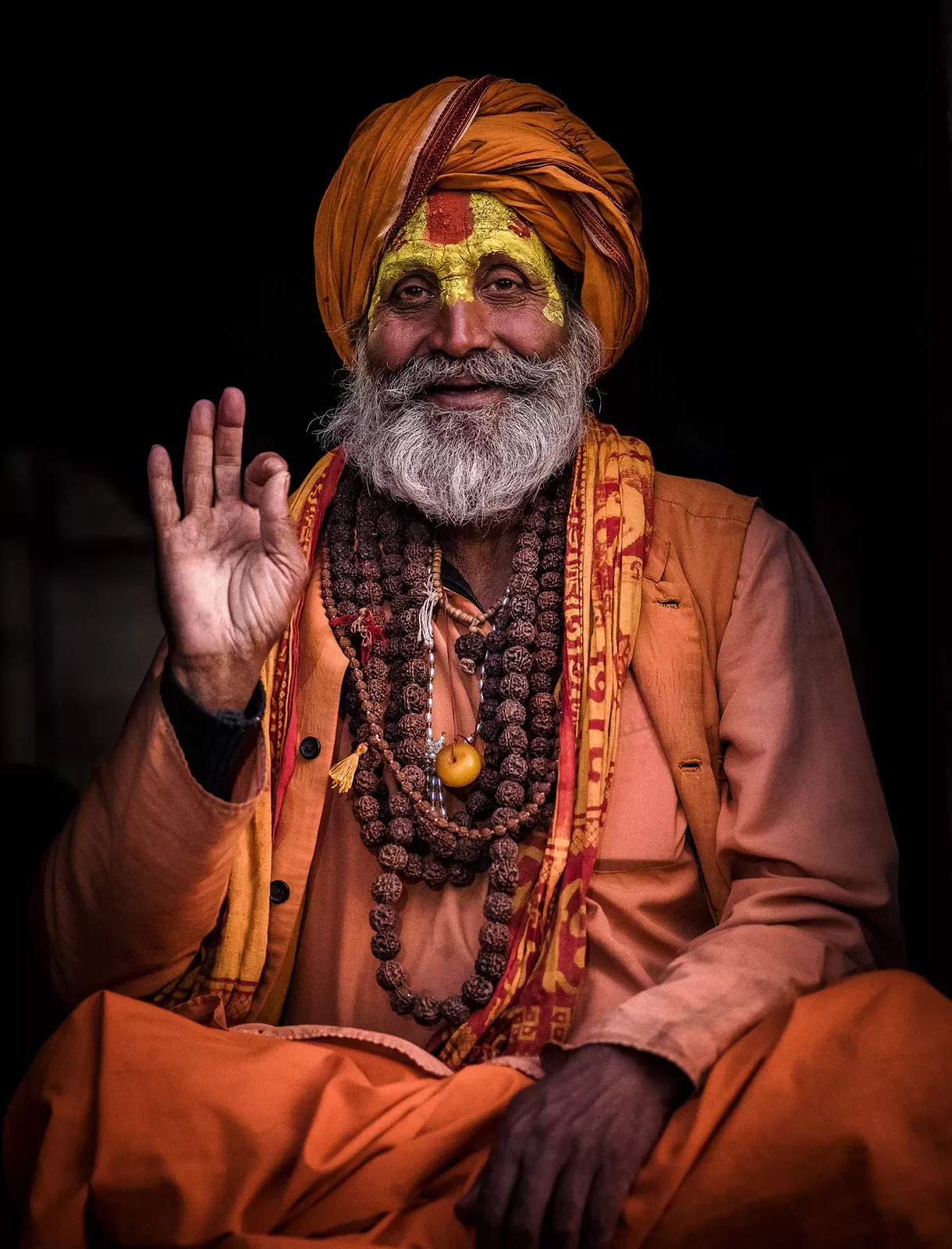 Old man with a beard and turban in traditional clothes in Nepal