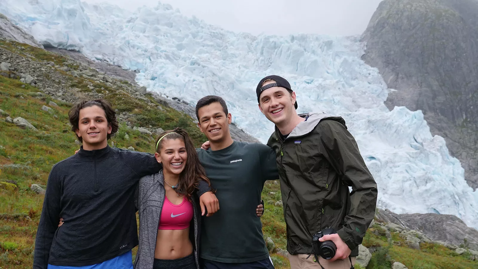 Group of four teenagers hiking in Norway