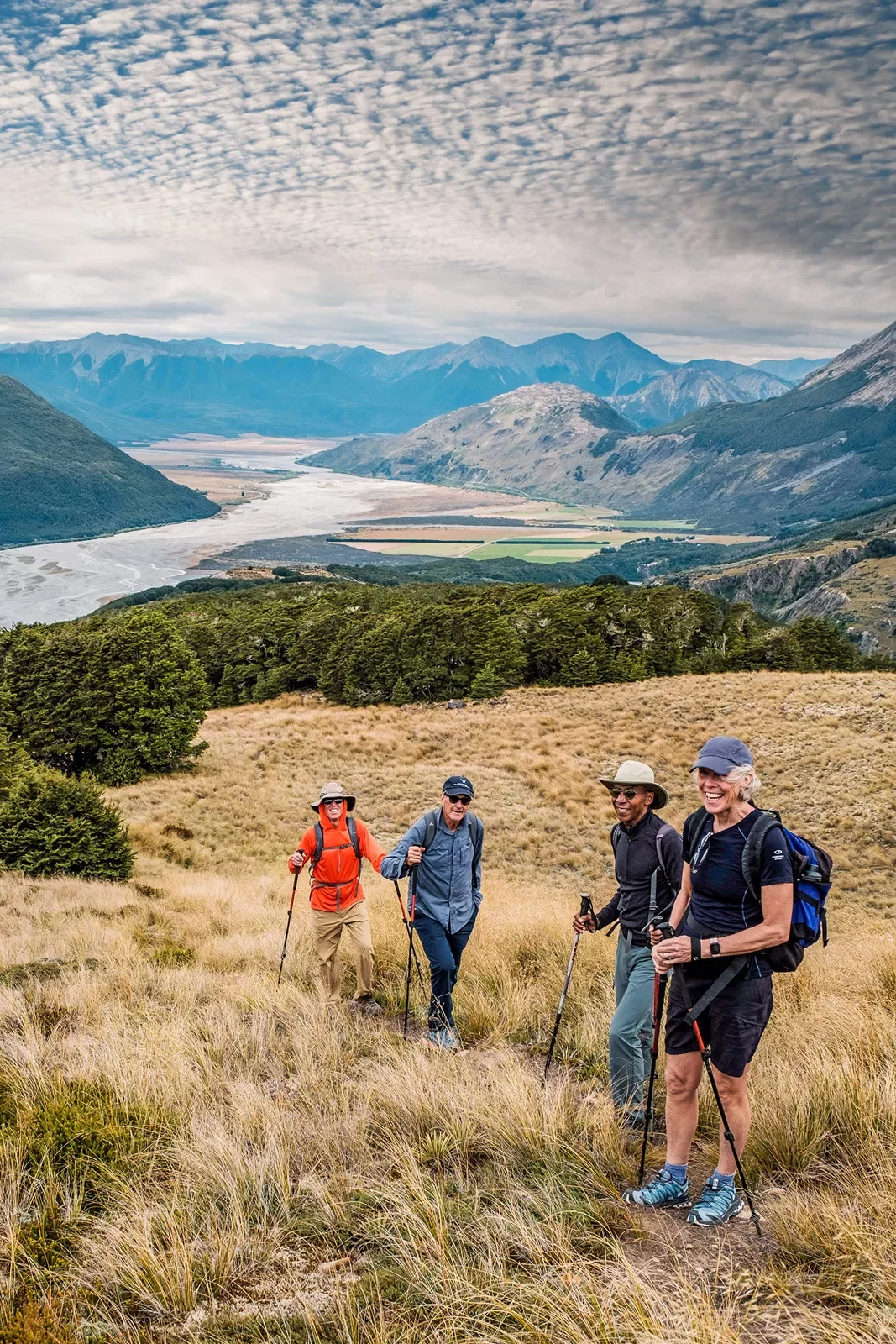 Hiking through a field in New Zealand