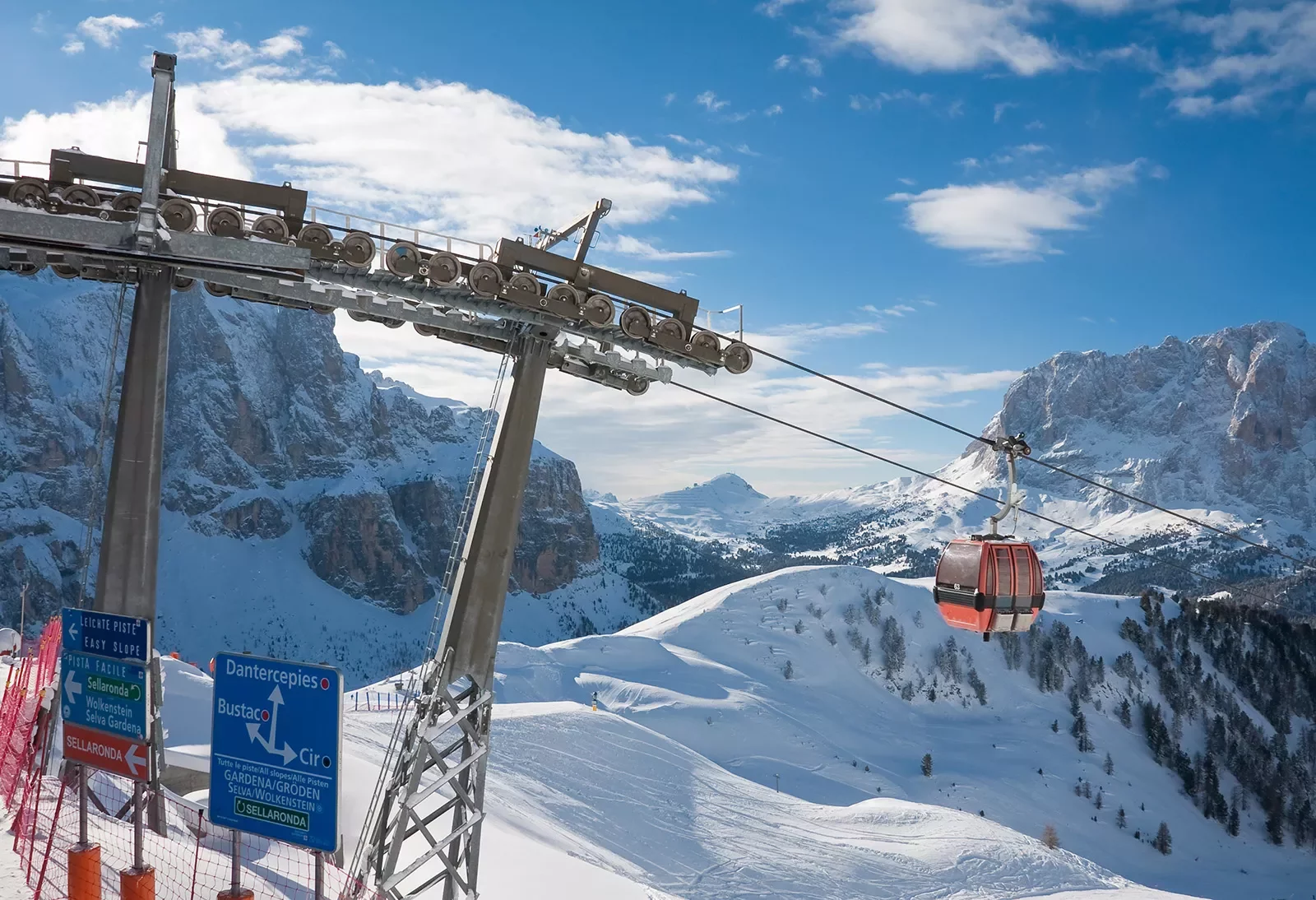 A gondola goes up a ski mountain