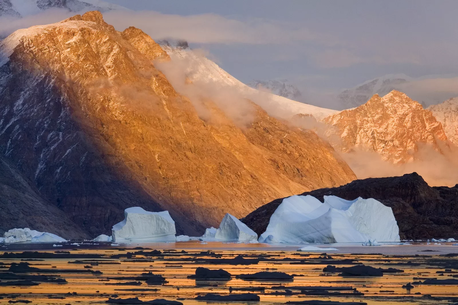 Orange mountains with icebergs