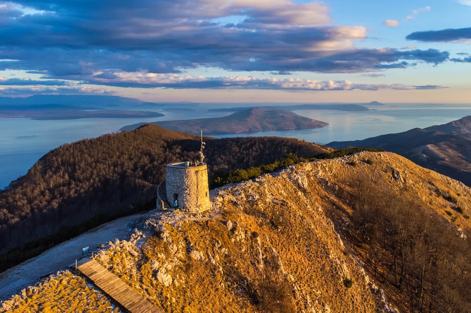 stone watchtower on a mountain peak