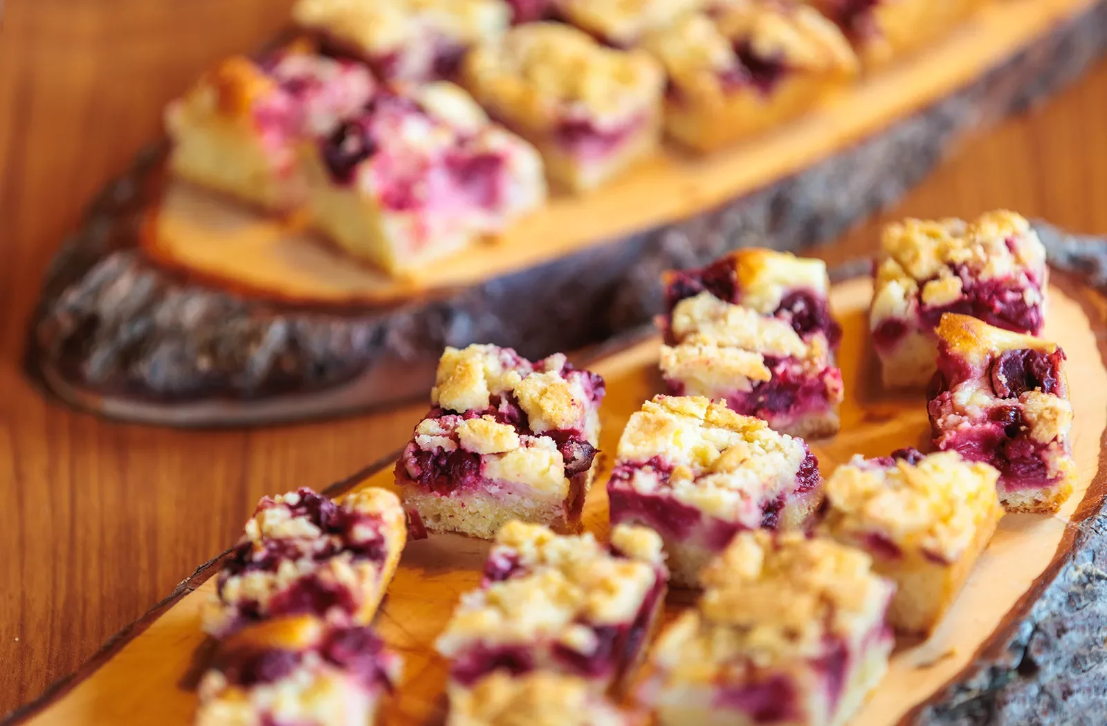 Berry pastries on a wooden plank