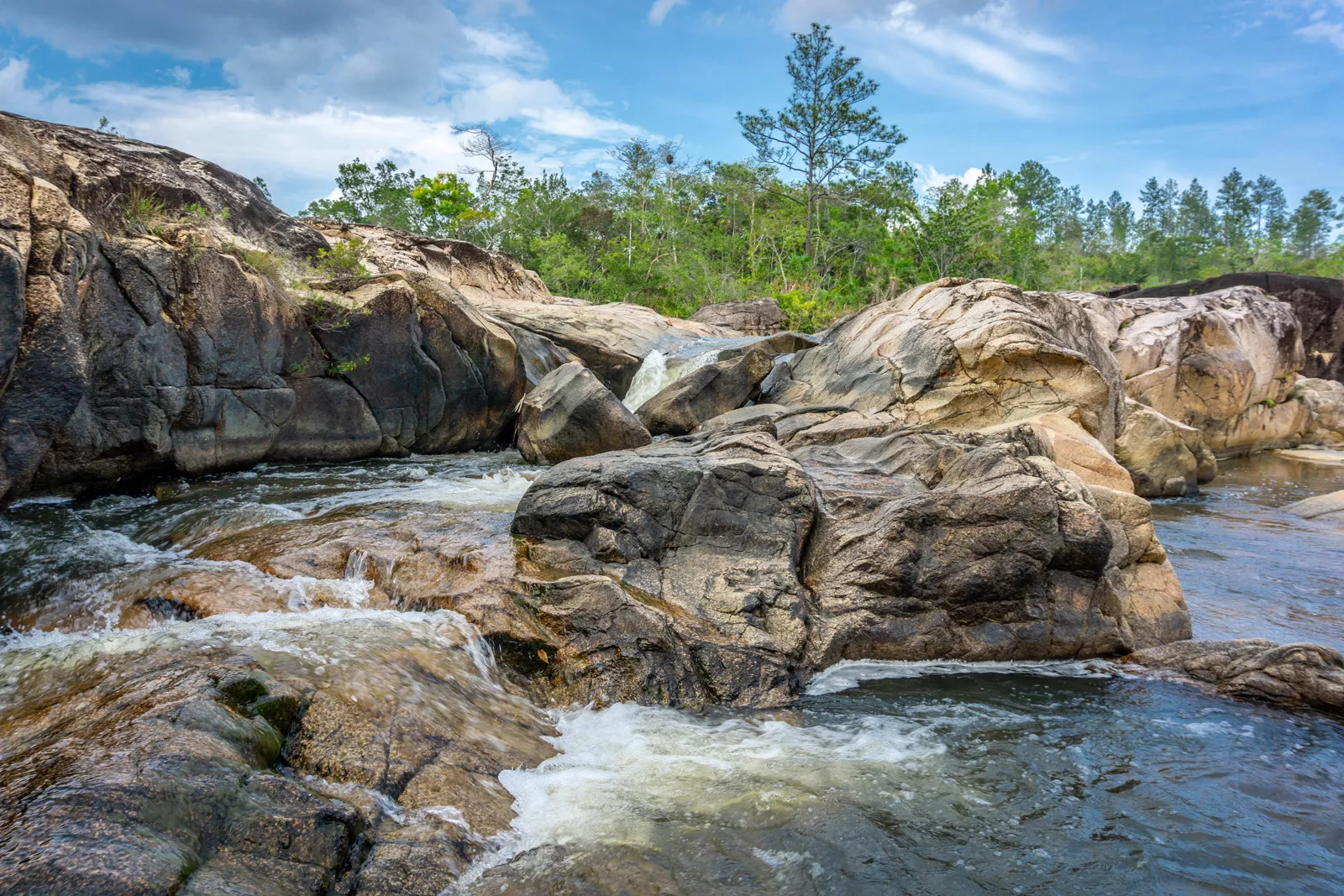 Large boulders with an active river