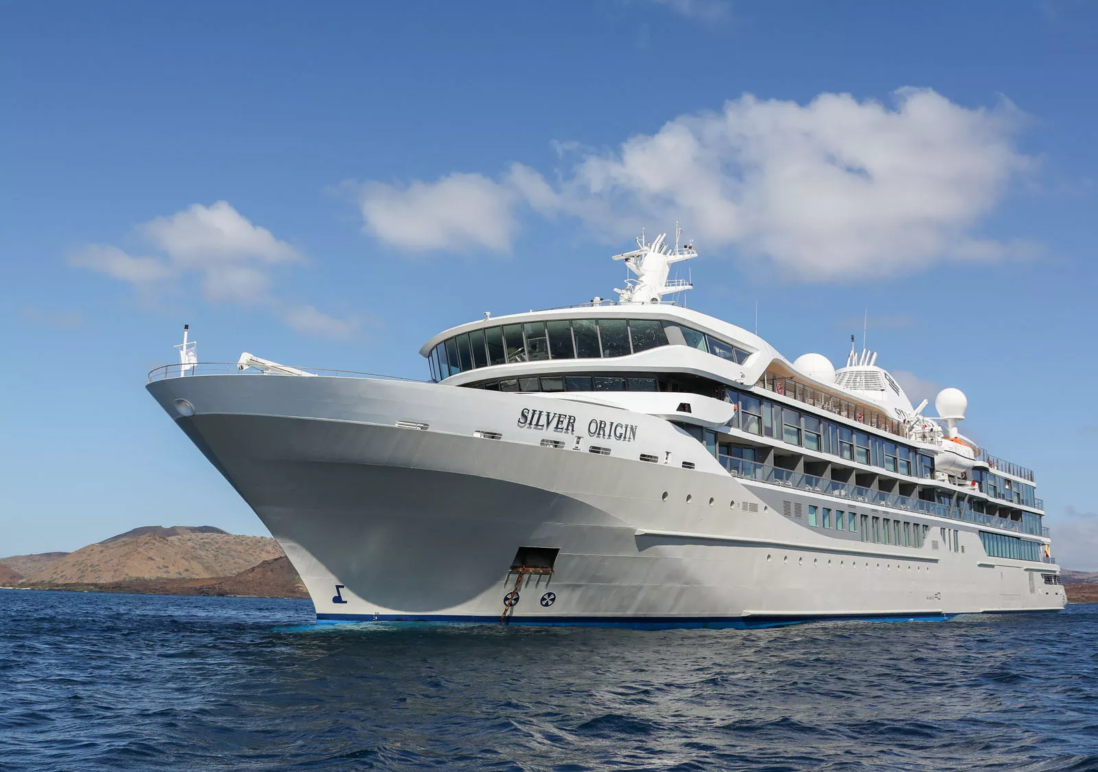 Exterior view of large, white boat on the ocean