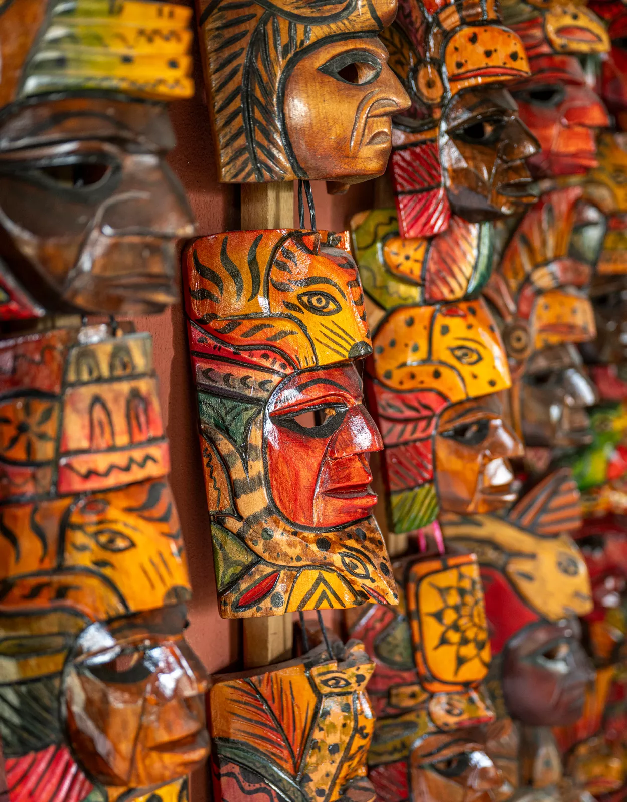 Carved, wooden sculptures of traditional masks