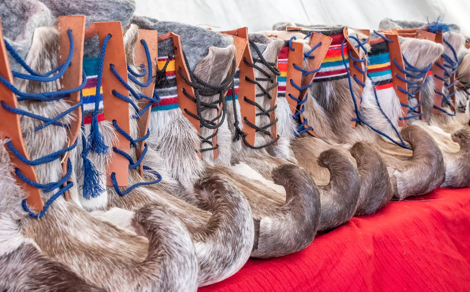 Boots covered with fur and leather side pieces on each boot