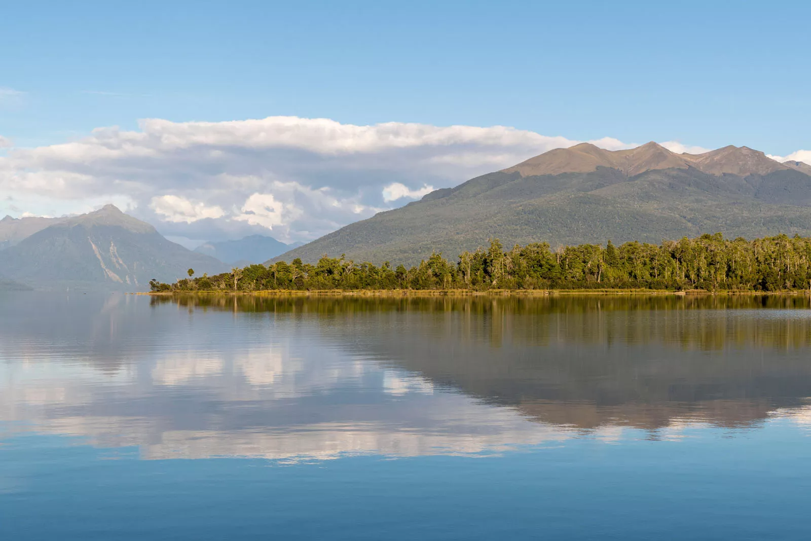 Large lake with hills in the background