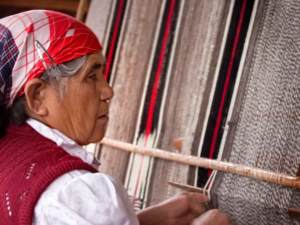 Local woman working with textiles.