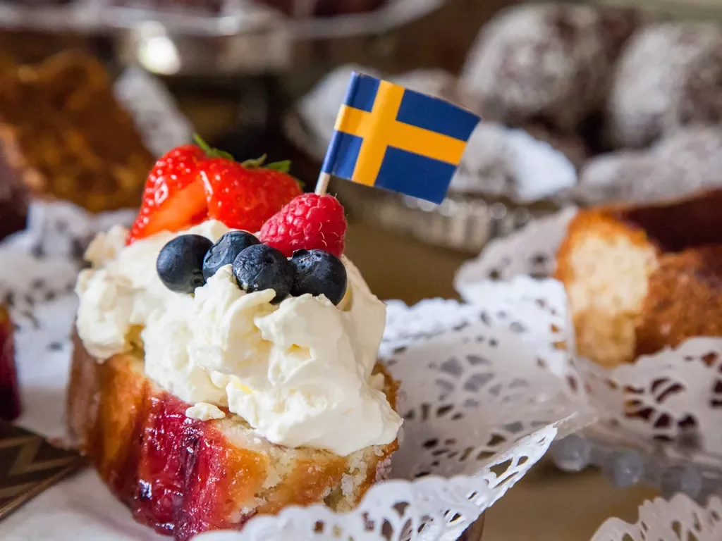 Cake, Blueberries, Strawberries Cream Swedish Flag on Top