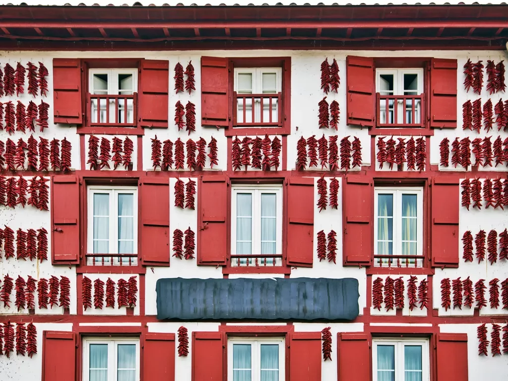 Red Espelette Peppers Drying in the Wall of a Traditional Basque House in Espelette Village, Basque Province of Labourd, France