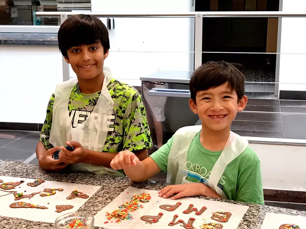 Kids making homemade chocolate