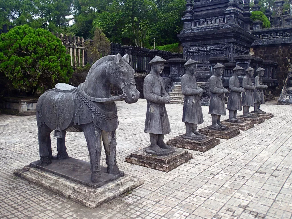 Row of stone statues at a temple in Asia