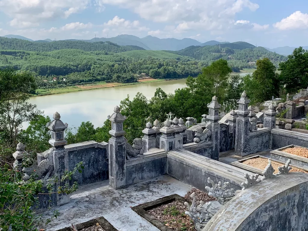 Shot of the Mausoleum of Emperor Khai Dinh, looking towards river.